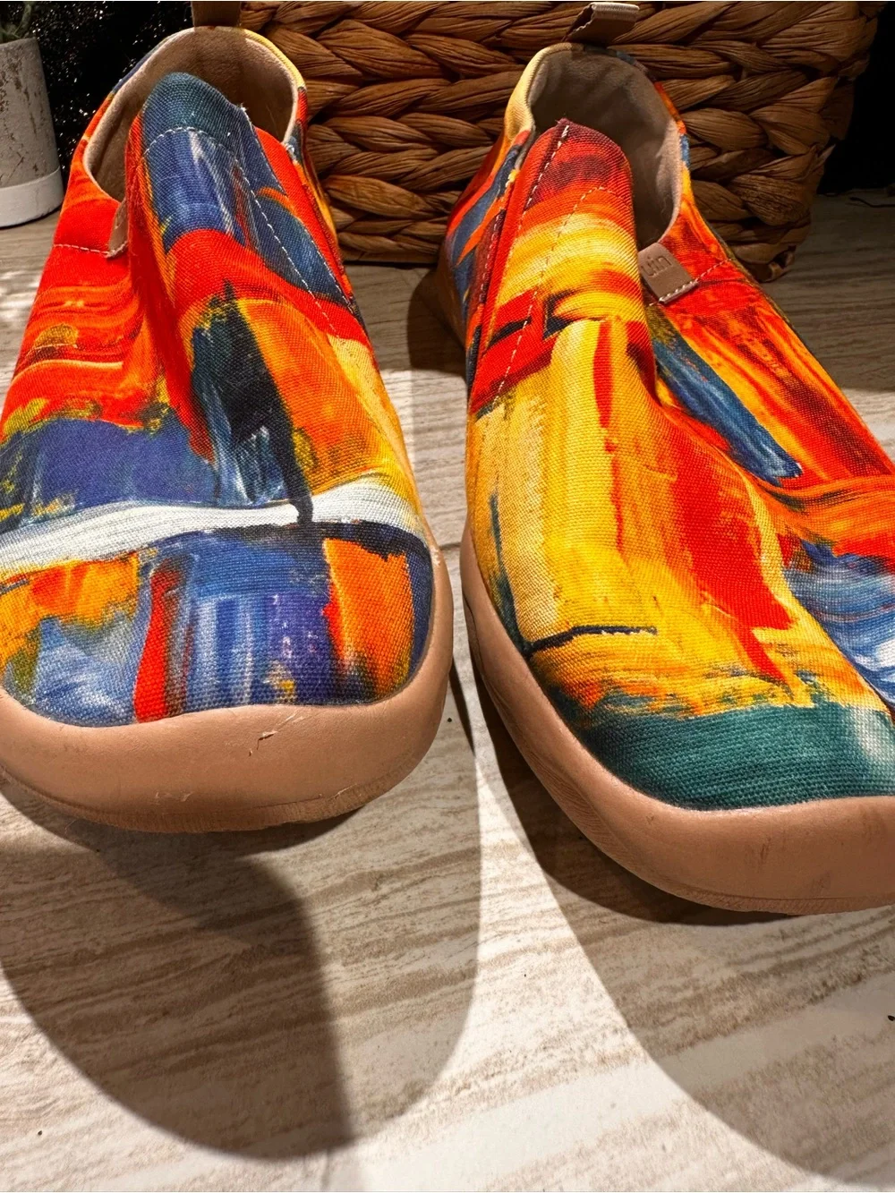 UIN Women's Slip-On Sneakers in Red, Yellow & Blue Abstract Print